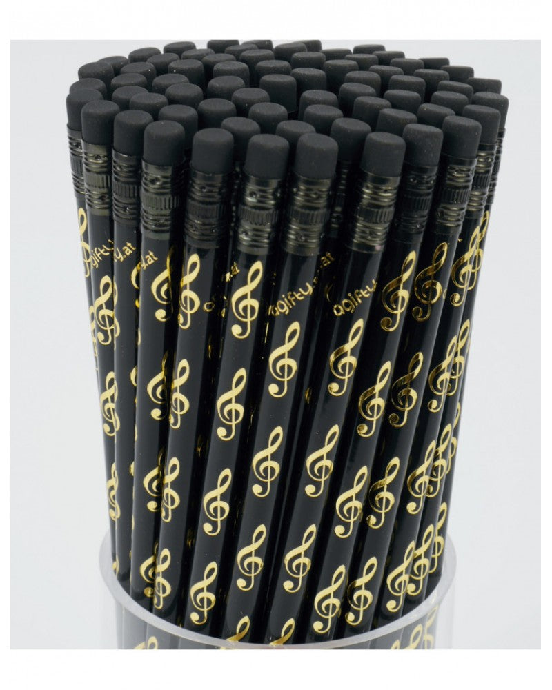 photo de Crayon de papier noir avec motifs clé de sol doré