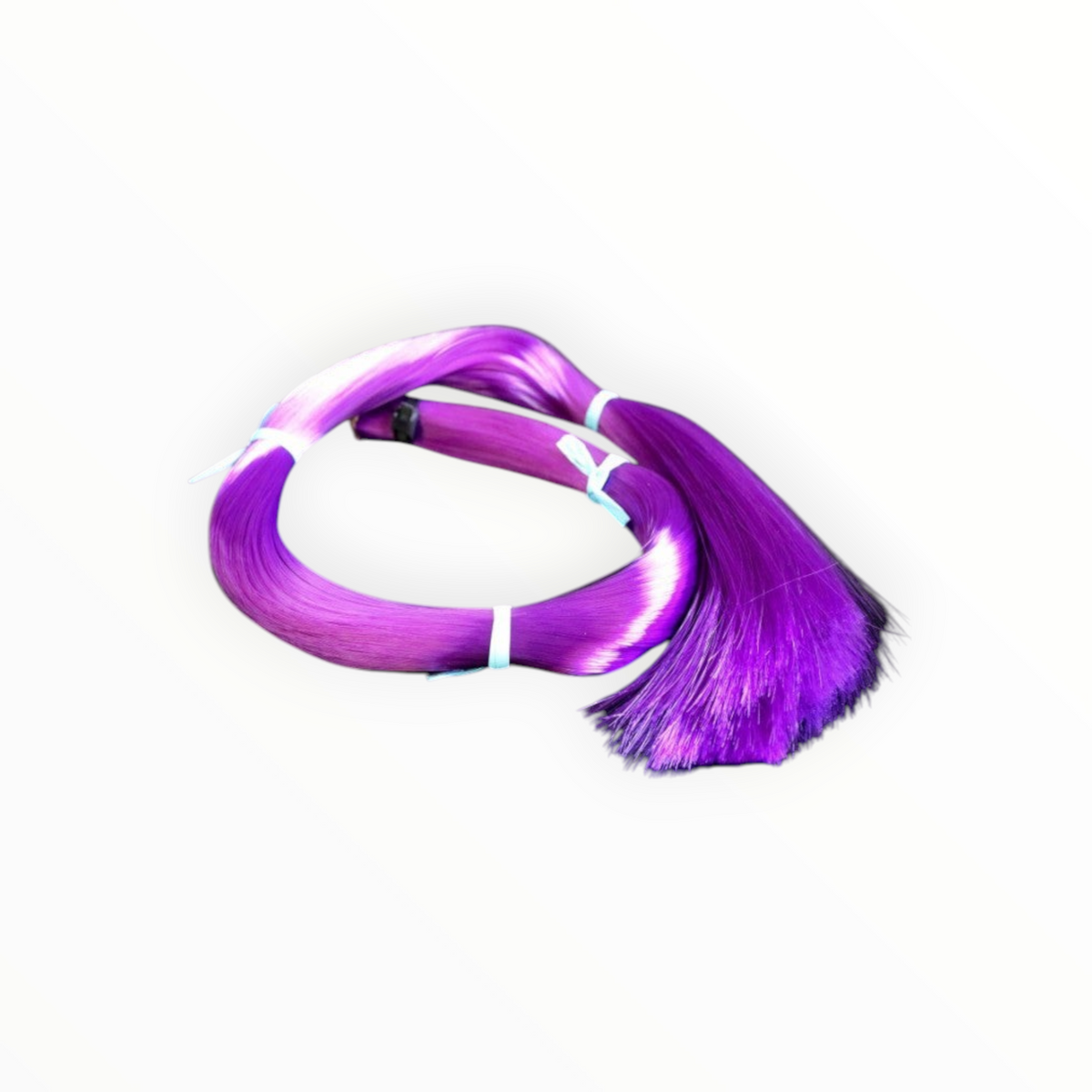 Botte de crin synthétique violet CORUSS de 250g pour remèchage d'archet, vendue par Lutherie d'Art