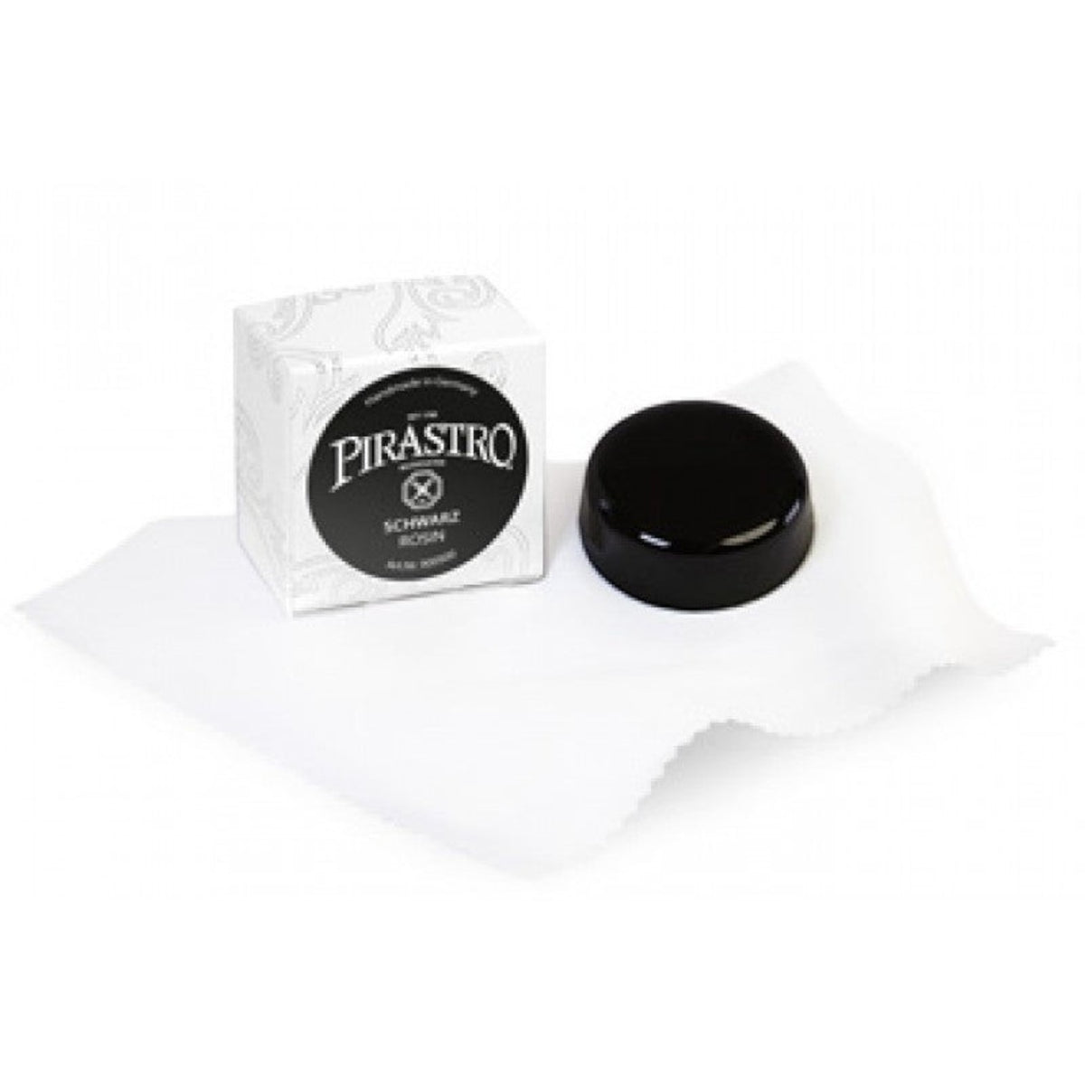 Colophane noire pour violon Pirastro Schwarz avec son emballage blanc Lutherie d'Art sur un tissu de protection